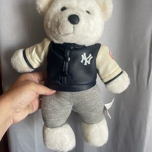 Charming White Plush Bear with Navy Jacket